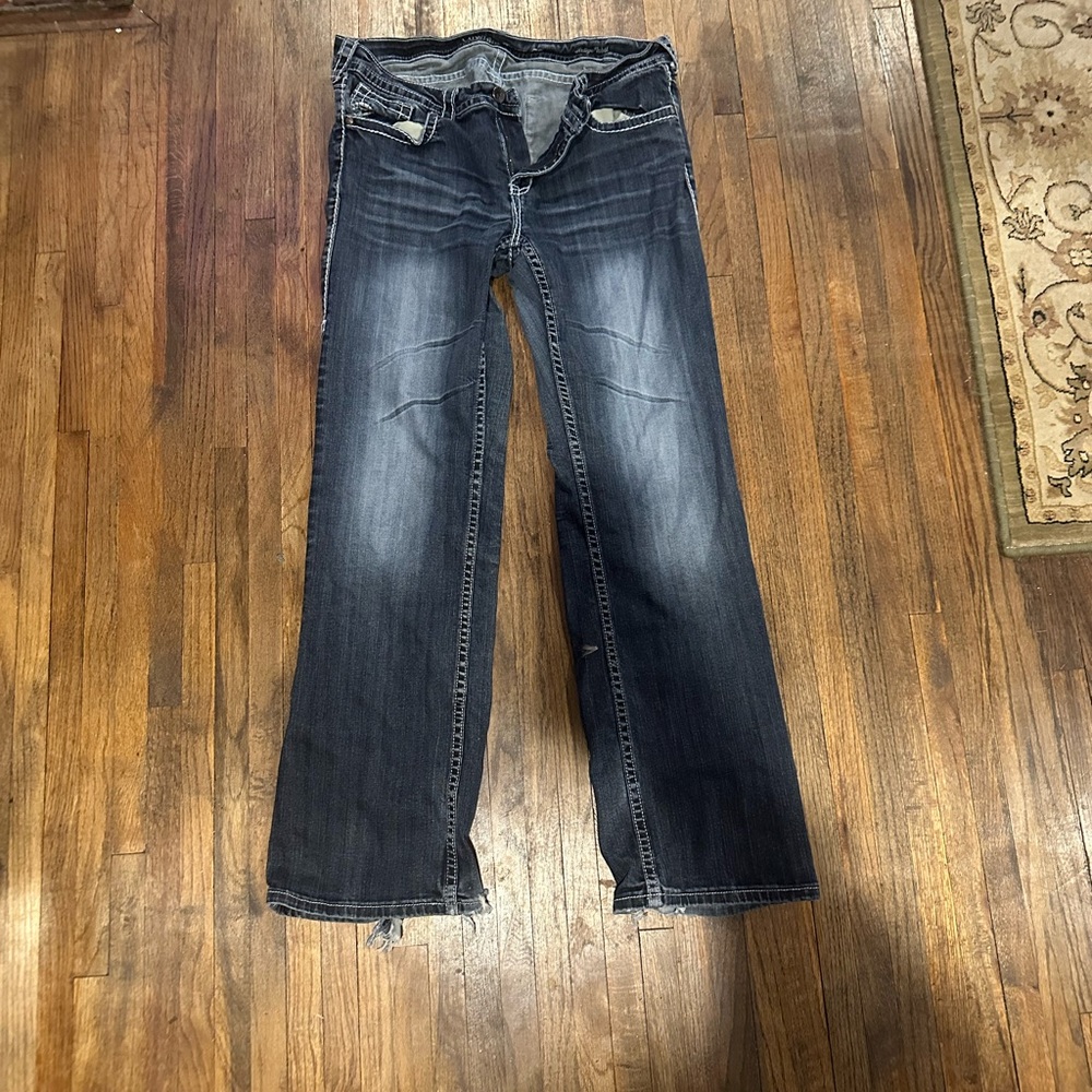 Cowgirl Tuff jeans.